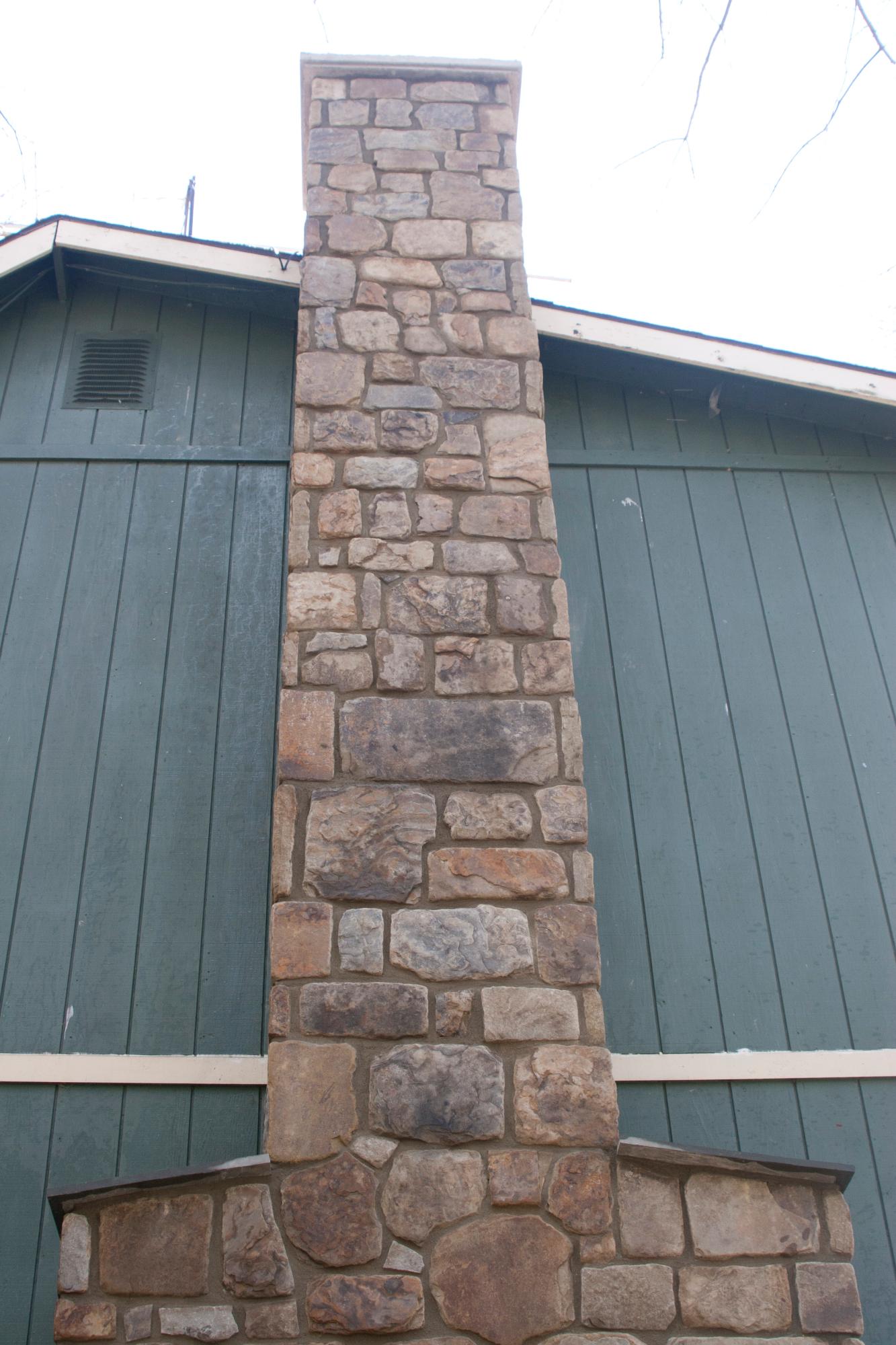 Cut stone chimney